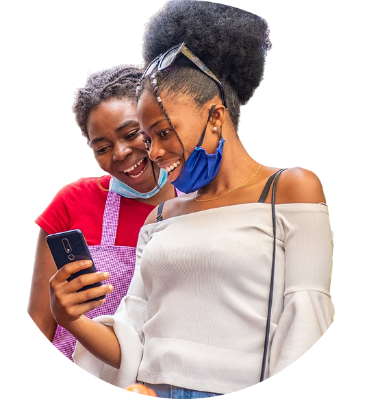 Two women viewing Vendsr on phone